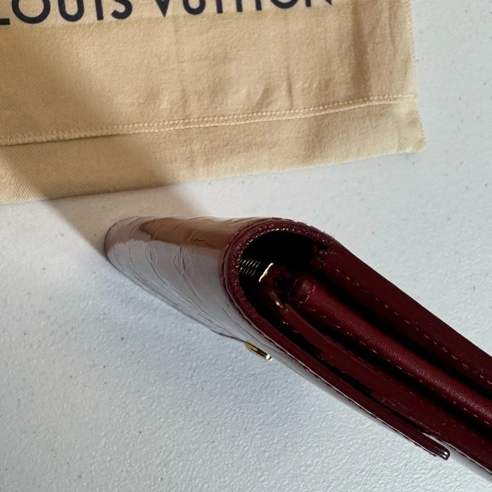 AUTHENTIC Louis Vuitton Red Wallet with Monogram Embossing